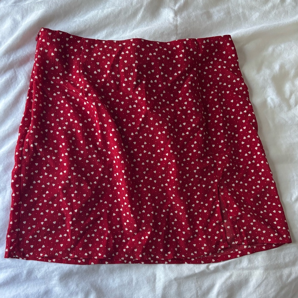 Size S red mini skirt with tiny hearts and slit